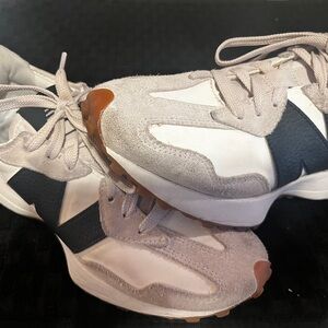 Stylish White and Black Sneakers